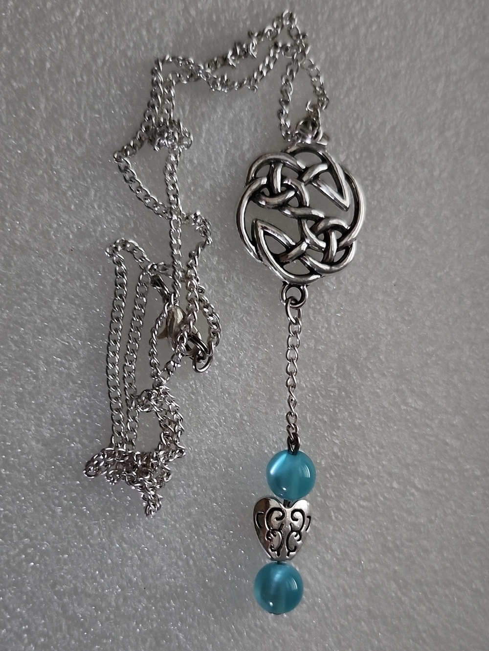 Hand Crafted Silver Celtic Pendant Necklace with Blue Beads